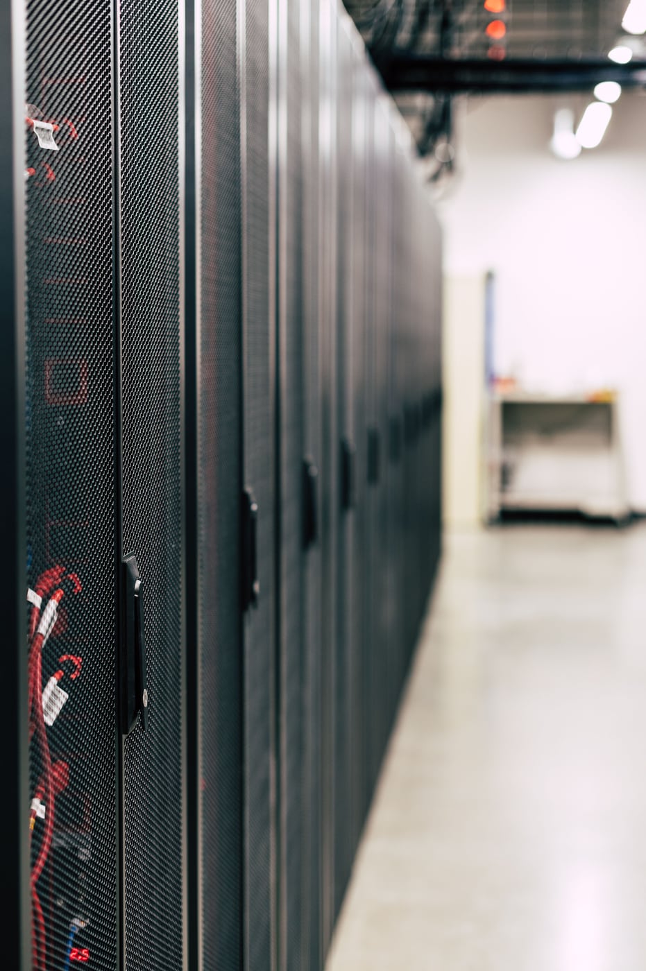 A row of server cabinets in a data centre.
