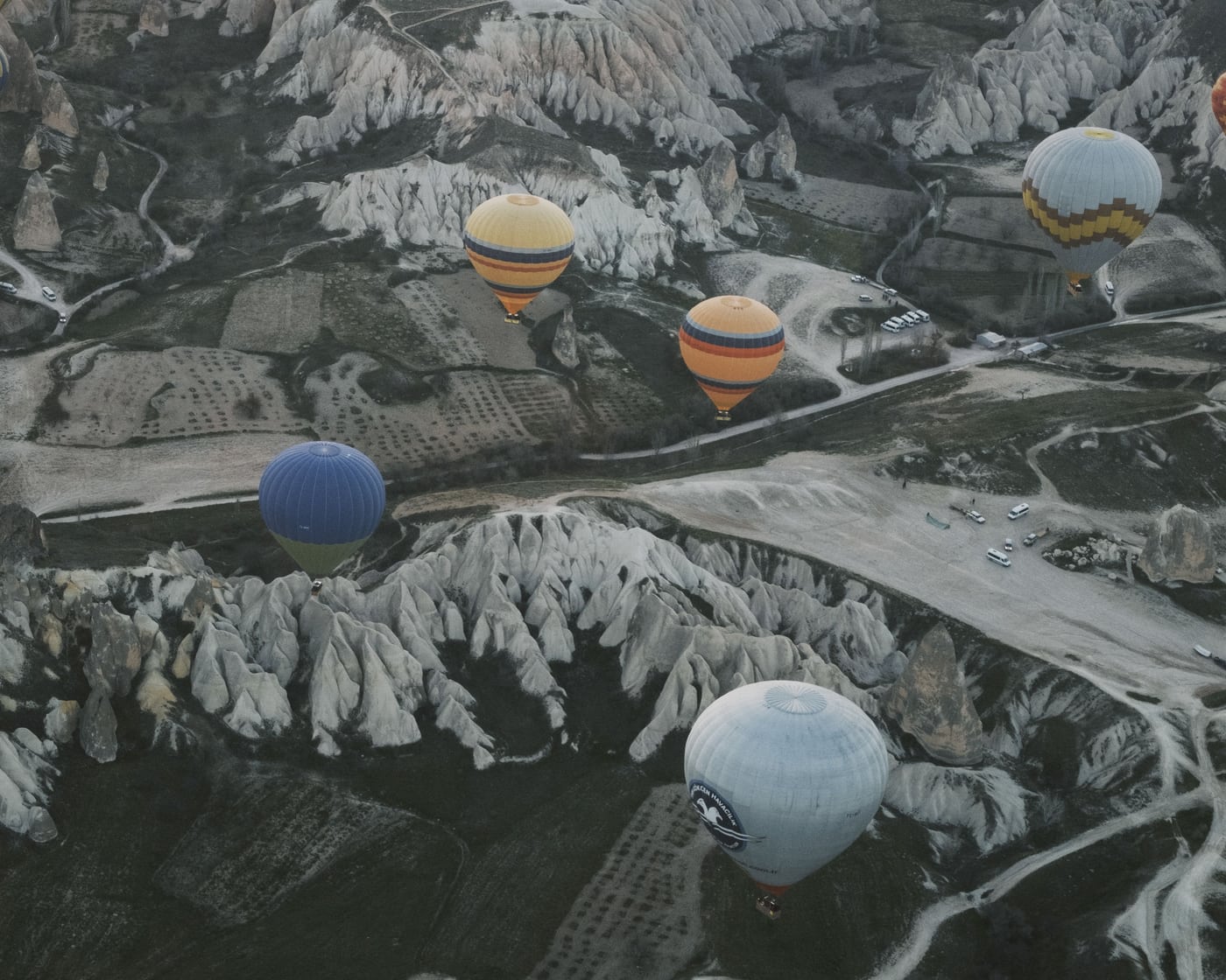 Hot air balloons above the rock formations of Cappadocia.
